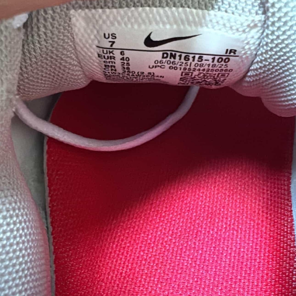 White and Red Sneakers with Supreme Logo